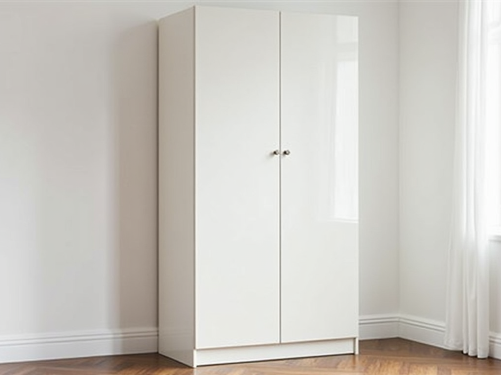 White minimalist armoire in a modern bedroom