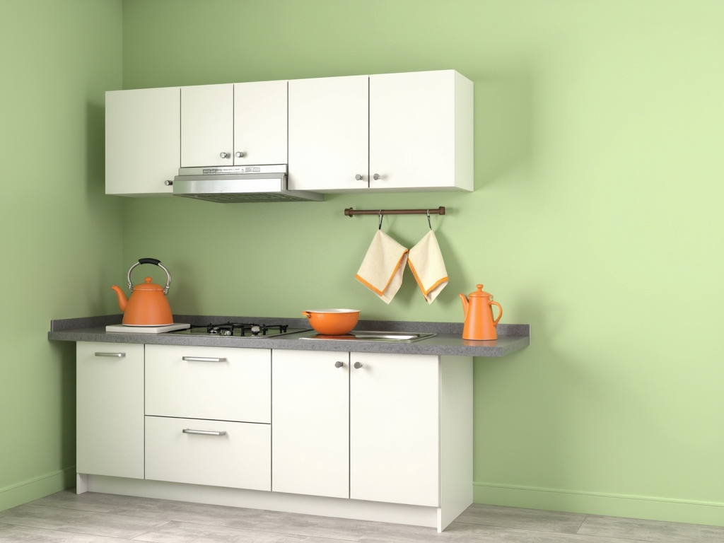 Small kitchen with green walls and orange accents